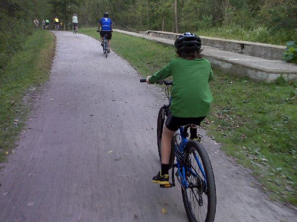 Family riding on the Towpath Trail